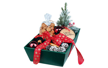 Drei aufgereihte Geschenktaschen mit Weihanchsmotiv